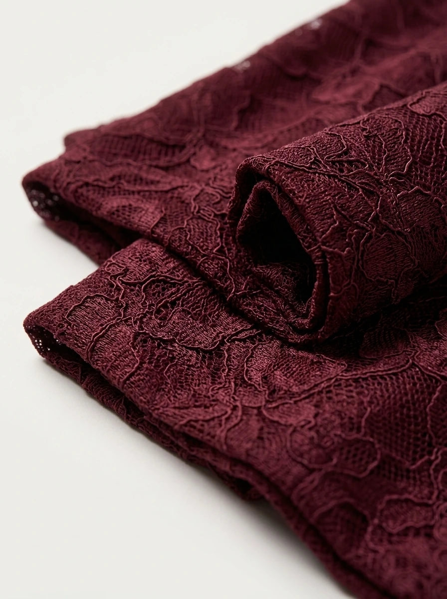 Elegant red occasion dress with textured jacquard fabric